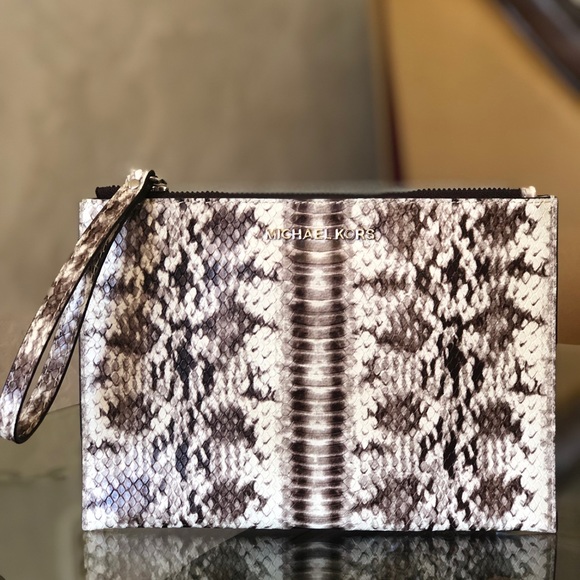 Michael Kors Handbags - NWT Michael Kors animal print XL clutch wristlet